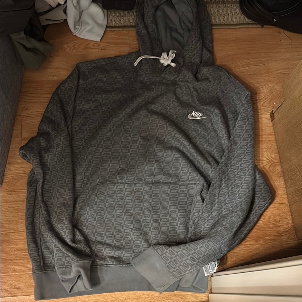 Nike Charcoal Patterned Hoodie with Nike symbols like new